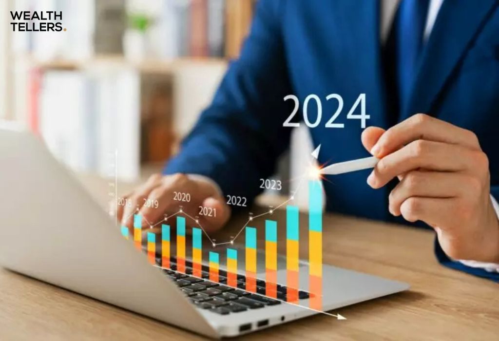 Business professional analyzing rising bar chart from 2018 to 2024 on laptop, symbolizing UAE market growth.